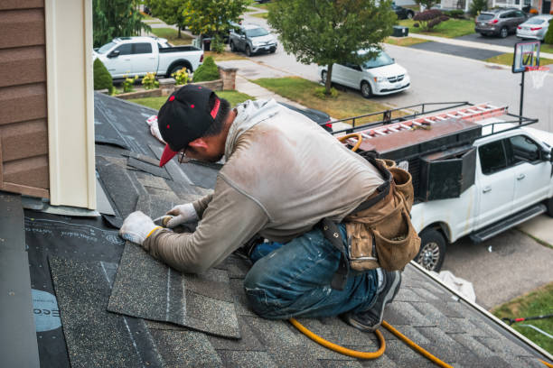 Professional Gutter Repair And Installation technician working in Howell, MI